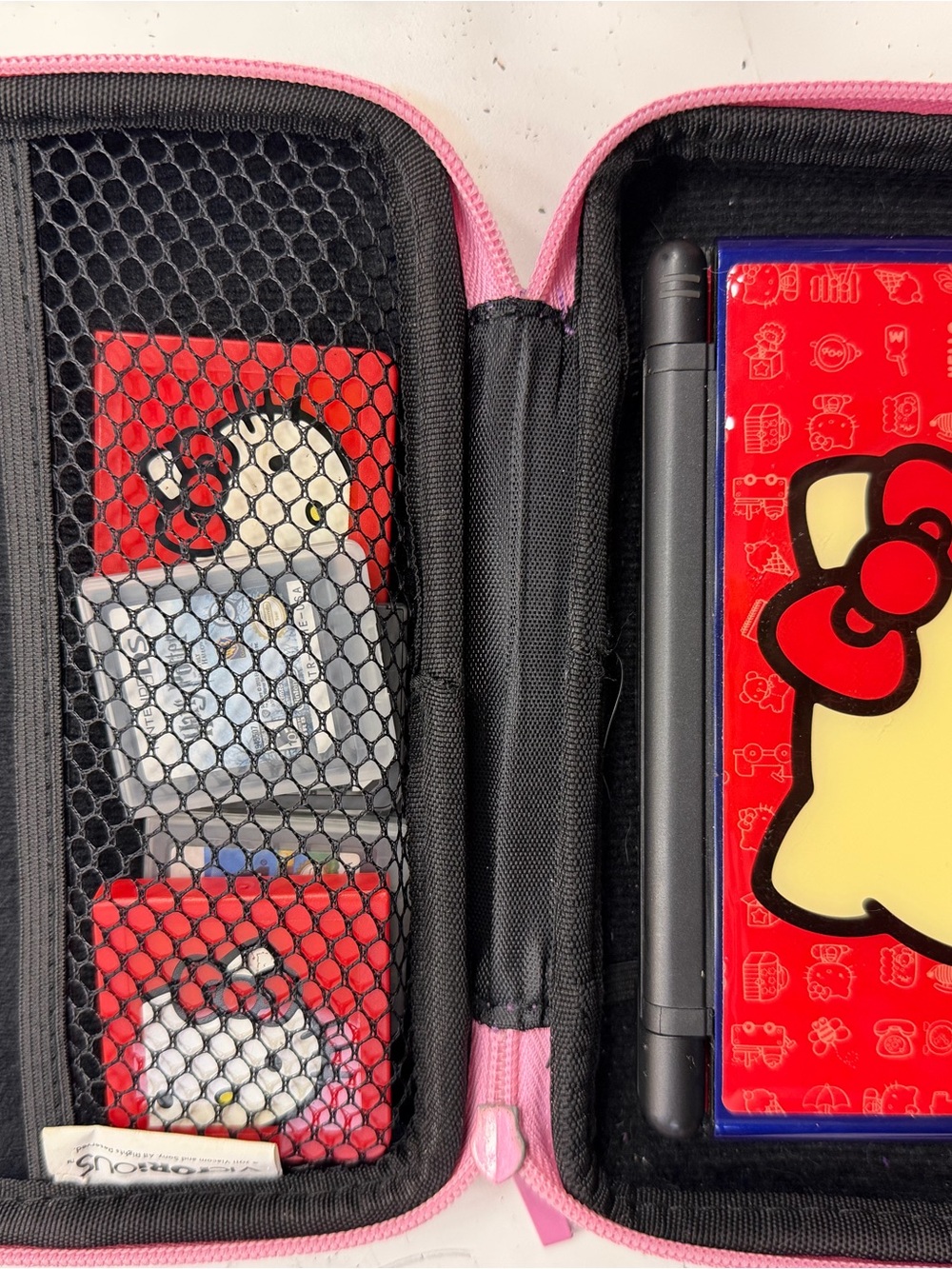 Nintendo DS lite with case and 7 games